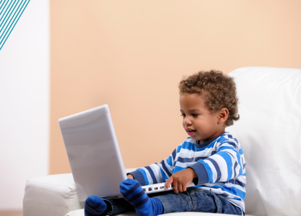 Child looking at laptop