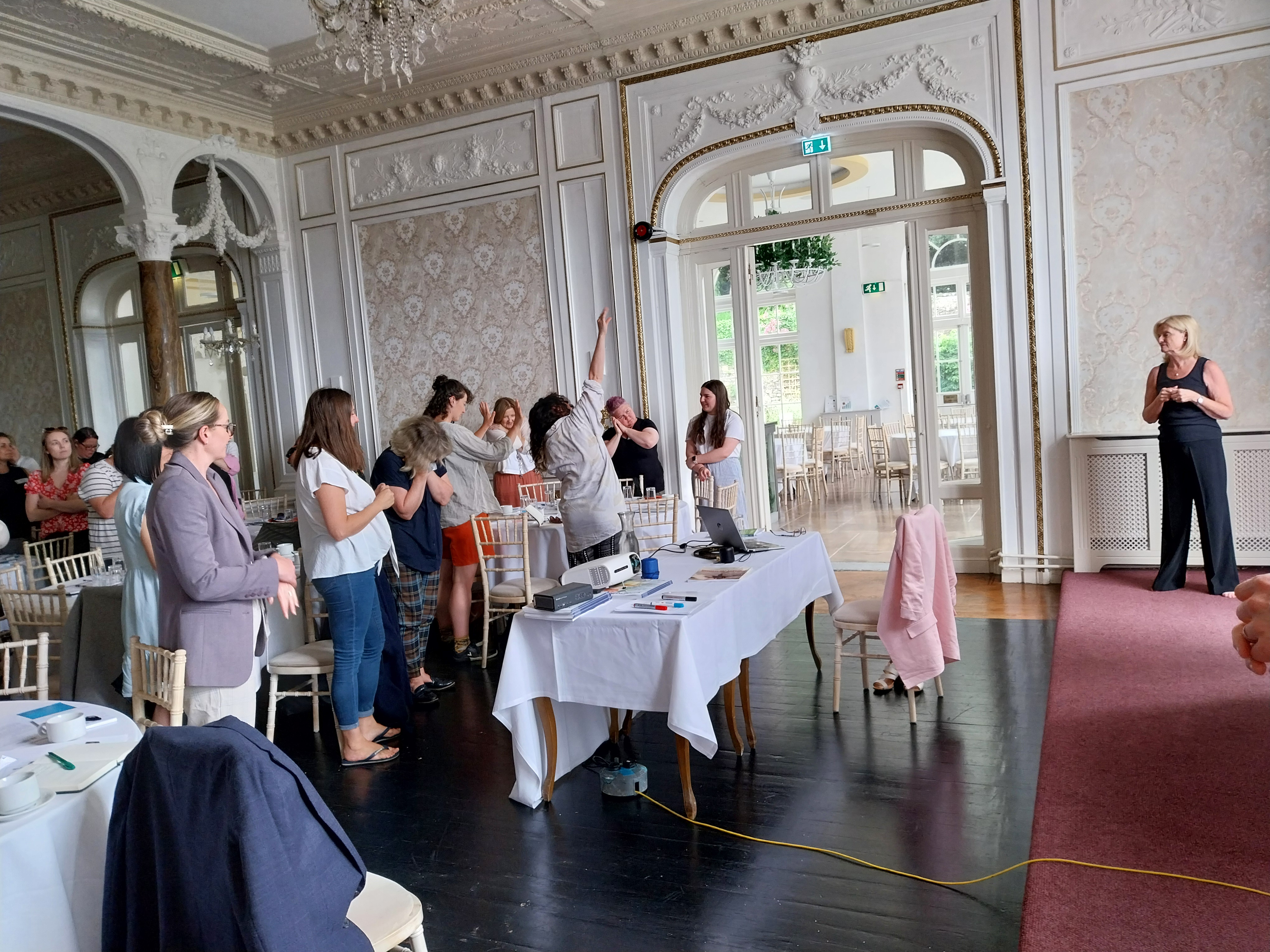 Participants standing and moving