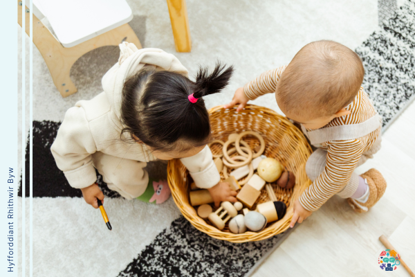 Children looking at toys in a basket