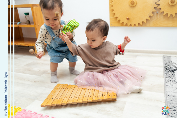 Children playing with a xylophone