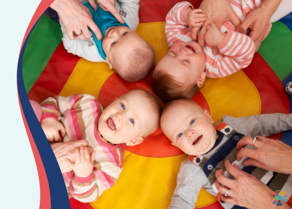 Little Movers Little Speakers Four babies lying on a mat