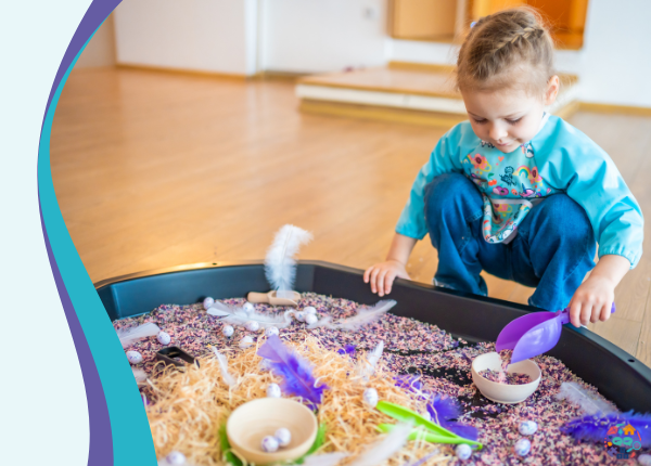Child playing in a sand pit