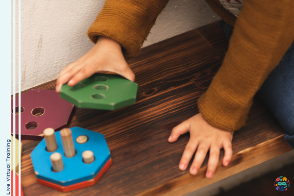 Child playing with multi-coloured blocks