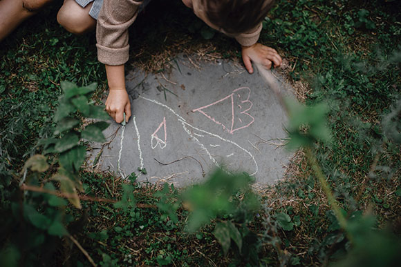 Child using chalk