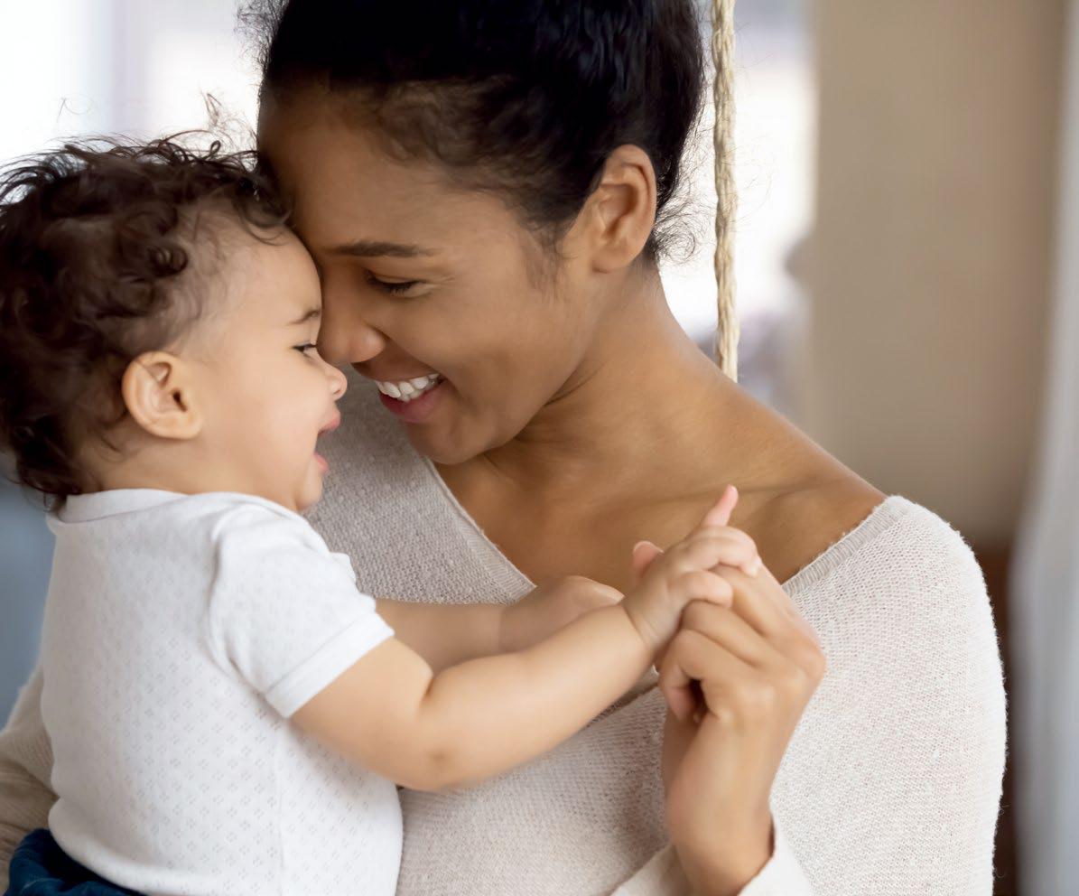 mother lovingly holding baby