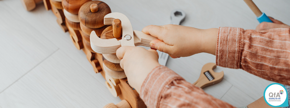 Child playing with tools