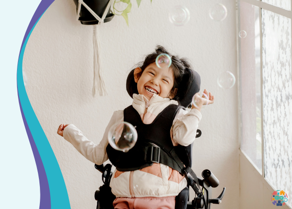 Early Years Wales Member Roadshow Child with additional needs enjoying bubbles