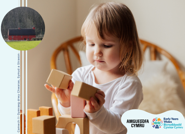 Child playing with wooden blocks