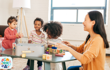Children and adults sat around a table